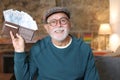 Surprised senior man with full wallet Royalty Free Stock Photo