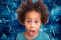 Surprised Shocked preschool boy in front of the blue technology background with flying letters and numbers around him