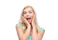 Surprised smiling young woman or teenage girl Royalty Free Stock Photo