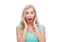 Surprised smiling young woman or teenage girl Royalty Free Stock Photo