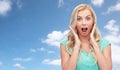 Surprised smiling young woman or teenage girl Royalty Free Stock Photo