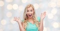 Surprised smiling young woman or teenage girl Royalty Free Stock Photo