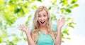 Surprised smiling young woman or teenage girl Royalty Free Stock Photo