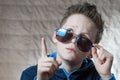 Surprised teen boy in sunglasses Royalty Free Stock Photo