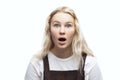 Surprised teenage girl with her mouth open. Cute young blonde with freckles. Isolated on a white background Royalty Free Stock Photo