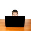 Surprised Teenager behind Laptop Royalty Free Stock Photo