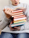 Surprised Teenager reads a Books