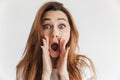 Surprised woman in casual clothes screaming with arms near mouth Royalty Free Stock Photo