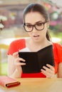 Surprised Woman Checking Restaurant Bill