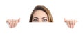 Surprised woman eyes over a blank promotional display Royalty Free Stock Photo
