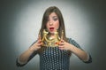 Surprised woman with golden crown. First place concept. Royalty Free Stock Photo