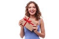 Surprised woman holding a nice gift box Royalty Free Stock Photo