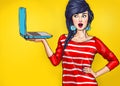 Surprised woman with laptop in the hand in comic style. Royalty Free Stock Photo