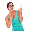 Surprised woman pointing at copy space Royalty Free Stock Photo