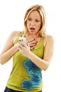 Surprised woman reading shocking sms text message Royalty Free Stock Photo