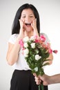 Surprised Woman Receiving Flowers Royalty Free Stock Photo