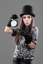 Surprised Woman with Top Hat and Alarm Clock on New Year
