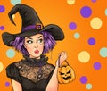 Surprised woman wears Halloween makeup, dressed in black outfit, , looks with amazing expression. Pop Art girl