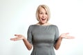 Surprised woman on white. Face expression, emotions, feeling attitude reaction Royalty Free Stock Photo