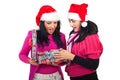 Surprised women open Christmas gift box Royalty Free Stock Photo