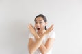 Sulk and grumpy face expression of woman in white t-shirt. Concept of offended peevish and sulky Royalty Free Stock Photo