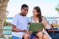 Surprised young couple looking at laptop screen. Royalty Free Stock Photo