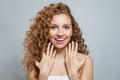 Surprised young healthy lady portrait. Perfect woman with long frizzy hairstyle, natural makeup and fresh skin Royalty Free Stock Photo