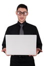 Surprised Young Man with Glasses Holding Laptop Royalty Free Stock Photo