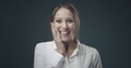 Surprised young woman smiling at camera Royalty Free Stock Photo