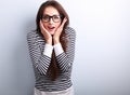 Surprising shocked young casual woman with open mouth and hands Royalty Free Stock Photo