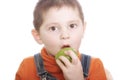 Surprized boy with green apple