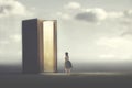 Surreal book opens a door illuminated to a woman, concept of way to freedom Royalty Free Stock Photo
