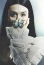 surreal butterfly rests on the hand of a girl, abstract concept Royalty Free Stock Photo