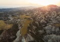 Surreal dramatic deserted earth landscape panorama with beautiful cliff formations and golden sunset background in Vashlovani Royalty Free Stock Photo