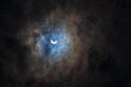 Surreal Dramatic Solar Eclipse Covered By Clouds. Natural Phenomenon