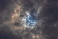 Surreal Dramatic Solar Eclipse Covered By Clouds. Natural Phenomenon