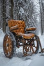 Surreal Empty Wheelchair outside in winter