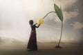 Surreal encounter of a girl who gently touches a giant flower Royalty Free Stock Photo