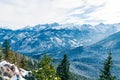 Surreal fantastic mountain landscape, turquoise blue mountains and snow-covered Christmas trees