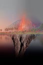 Surreal Floating Cracked Island with Fiery Core and Volcano Backdrop Royalty Free Stock Photo