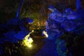 Surreal illuminated rockery in the park