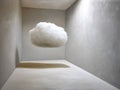 A surreal image depicts a fluffy white cloud suspended in a minimalistic, empty