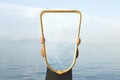 Surreal image of a transparent mirror concept of door to freedom