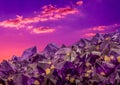 Surreal macro photo of amethyst crystals and sunset sky Royalty Free Stock Photo