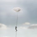 Surreal man reaches the sky hanging from a cloud