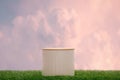 Surreal minimal podium outdoors on green grass in blue sky pink gold pastel cloud with space.Beauty cosmetic product placement Royalty Free Stock Photo