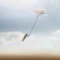 Surreal moment of a man who is dragged into the sky by a cloud