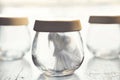 Surreal moment of a woman inside a glass jar