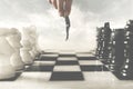 Surreal photo of a hand moving a human pawn on a chessboard, a concept of power and control in business