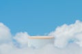 Surreal podium outdoor on blue sky soft white clouds with space.Beauty cosmetic product placement pedestal present stand minimal Royalty Free Stock Photo